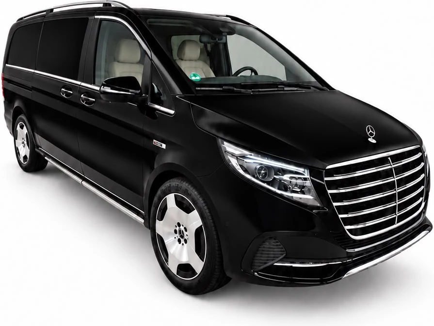 Schwarze Mercedes-Benz V-Klasse des Kunden mit individuellem Chrom-Kühlergrill im Maybach-Stil und speziellen Felgen, Ansicht von schräg vorn